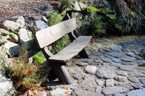 bench wooden the stones