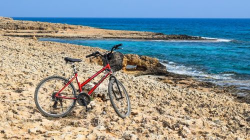 bicycle rocky coast sea
