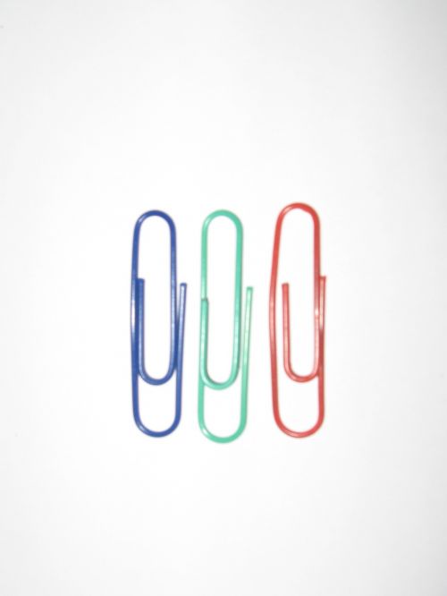Big Paper Clips On White Background