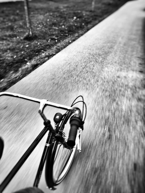 bike on the road black and white ride