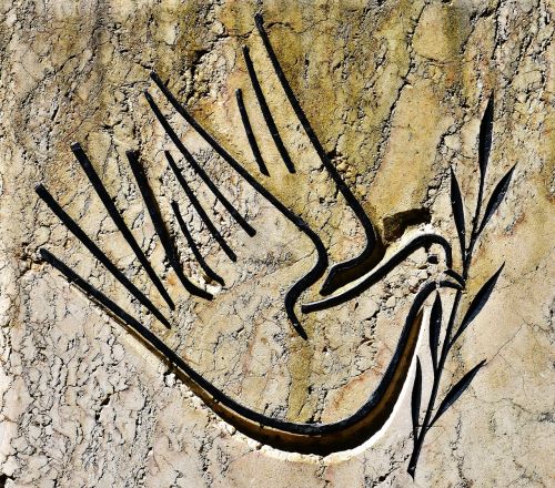 bird abstract stone wall