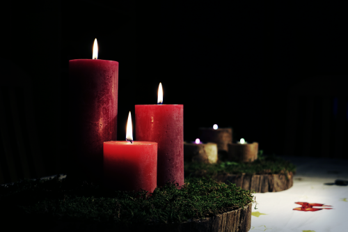 black candle candlelight