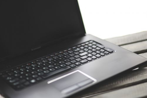 black notebook laptop