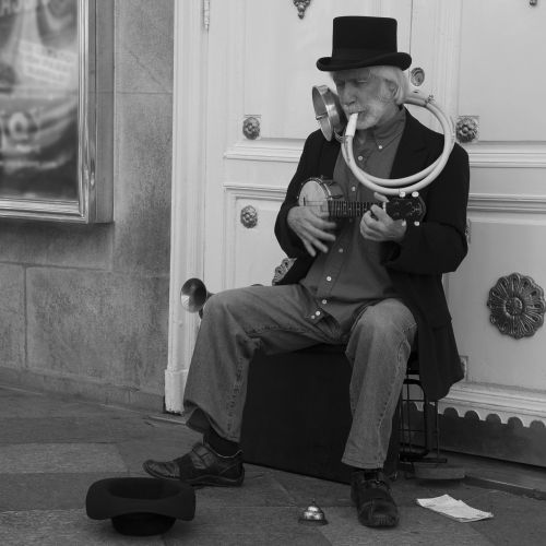black and white one man band street