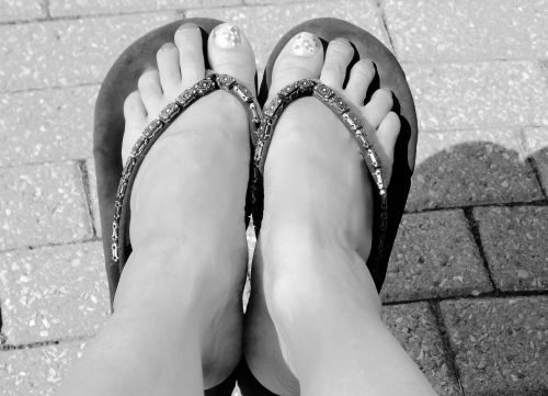 black and white feet sandals