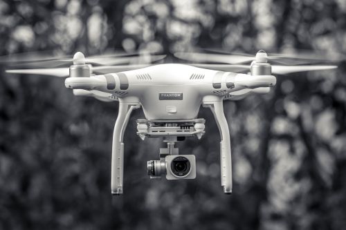 black and white drone flying