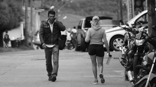 black and white people walking