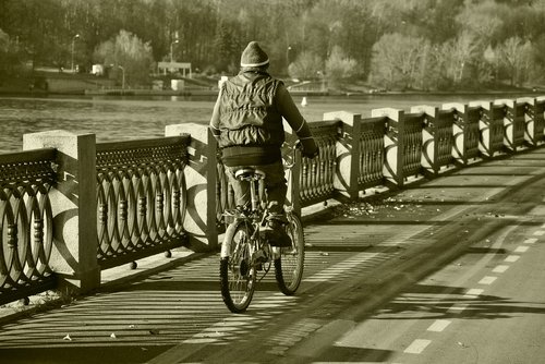 black and white  cyclist  man