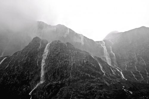 black and white waterfall mountain