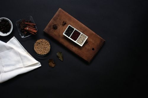 black background container spices