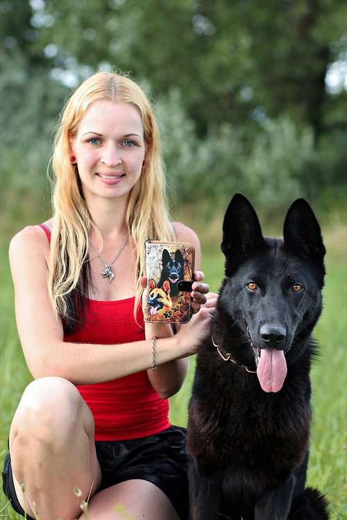 black german shepherd  dog  blonde woman
