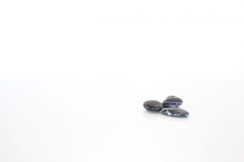 black pebble stones isolated stones stone