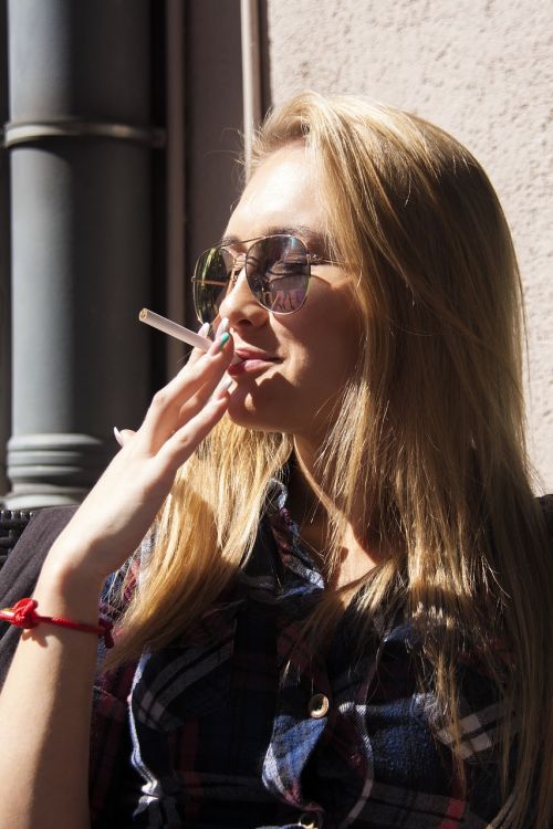 blonde girl smoking