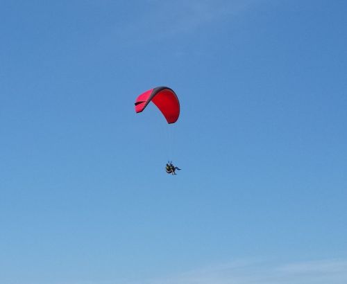paragliding fly blue