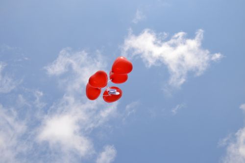 blue sky red balloons blue