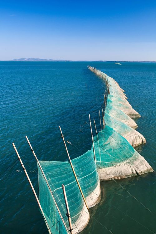 blue sky the sea fishing nets