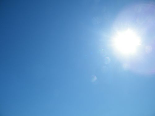 blue sky sun halo