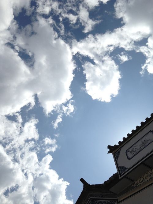 blue sky white cloud eaves