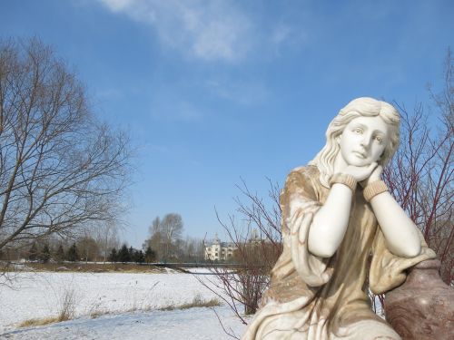 blue sky sculpture snow