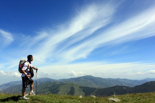 blue sky on foot backpack