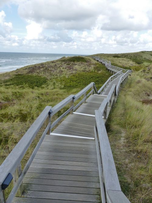 boardwalk sky clouds