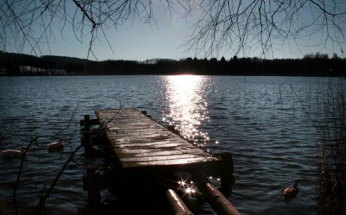 boardwalk sunset lake