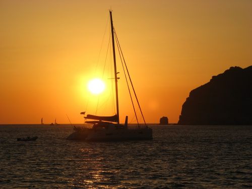 boat catamaran sunset