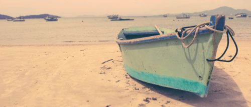 boat sea sand