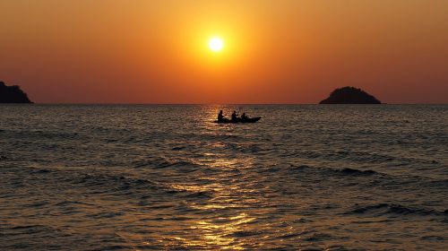 boat sunset island