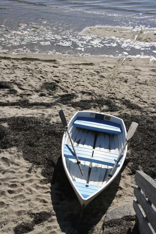 boat ocean sand