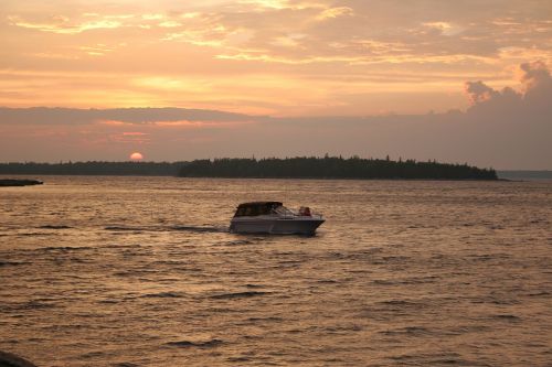 boat sunset river
