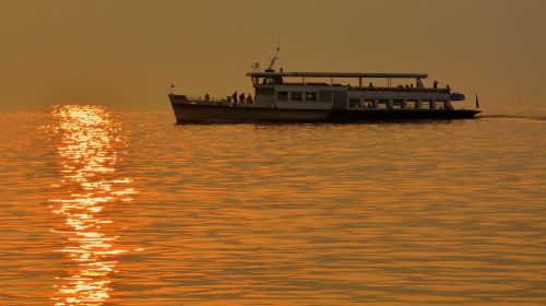 boat lake sunset
