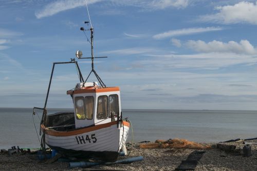 boat beach sky