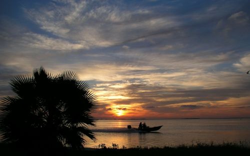 boat ocean sky