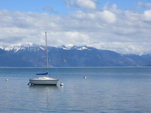 boat  lake geneva  mountains