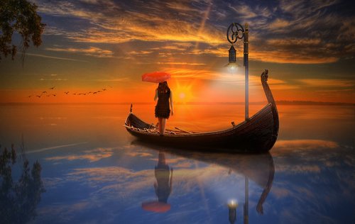 boat  woman  sunset