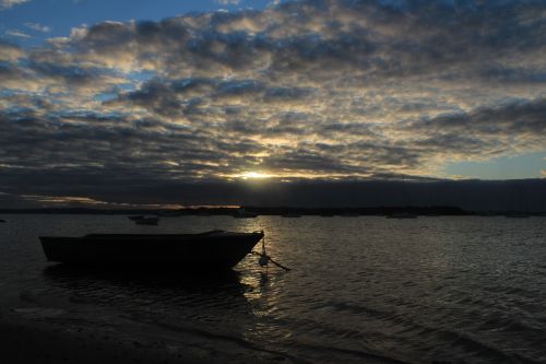 boat sunrise water