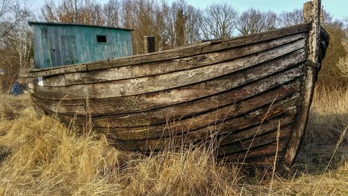 boat wreck  boat  wooden boat