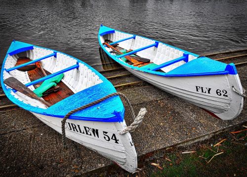 boats moored blue