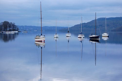 boats reflection lake