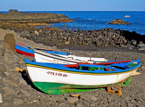 boats fishing rocks