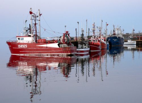 boats reflection fishing