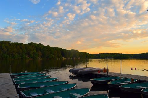 boats sunset lake