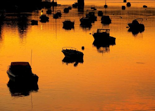 boats sunset bridge