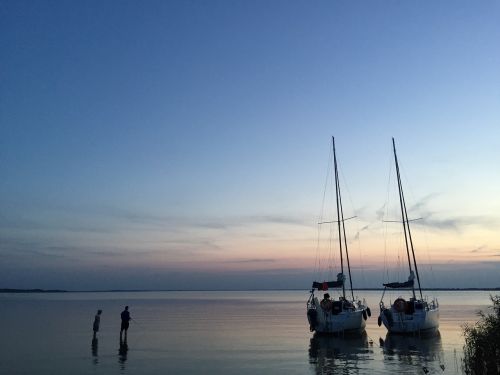 boats evening angler