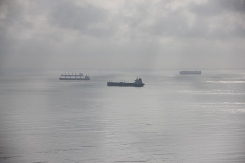 boats  sun  fog