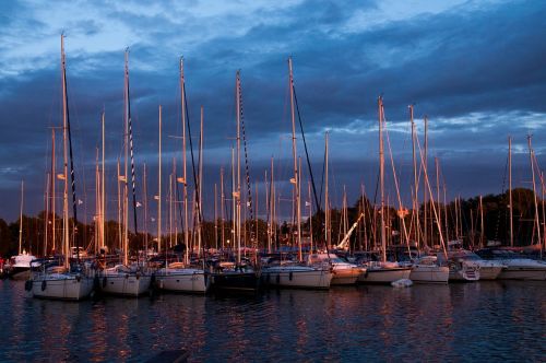 boats sailboats sunset