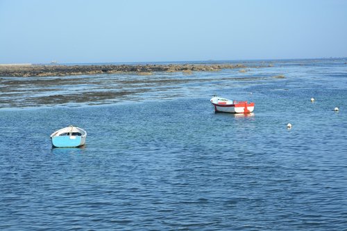 boats floating  panoramic views  sea