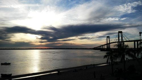 body of water panoramic sunset