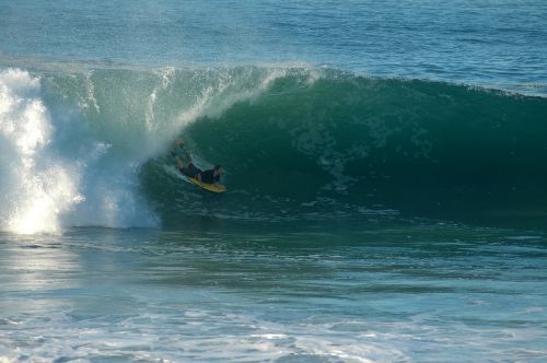 boogie board surfing wave